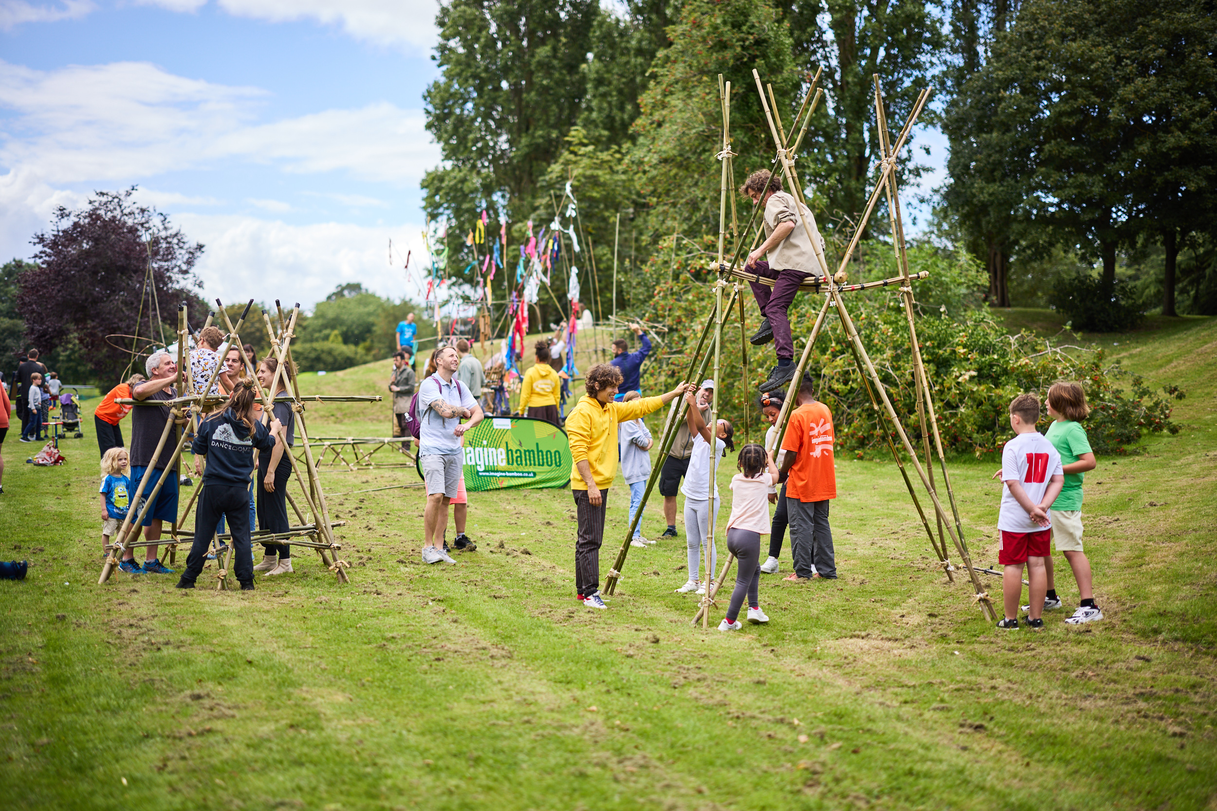 People try out circus equipment made of bamboo